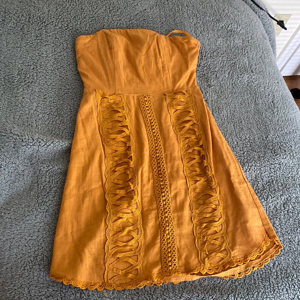 Light orange strapless mini dress